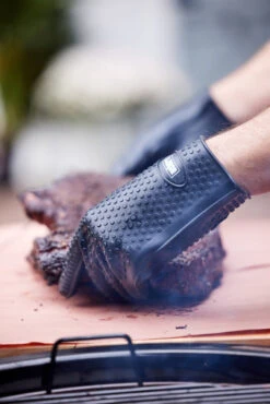 Weber® Silicone Grilling Gloves -Garden Outdoor Shop Weber Silicone Grilling Gloves in use 42612.1651566701