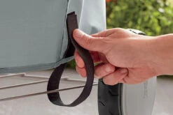 Weber® 47cm Charcoal Barbecue Cover, Polyester -Garden Outdoor Shop close up detail of the fasteners on the weber 47cm charcoal barbecue cover polyester 30737.1626619141